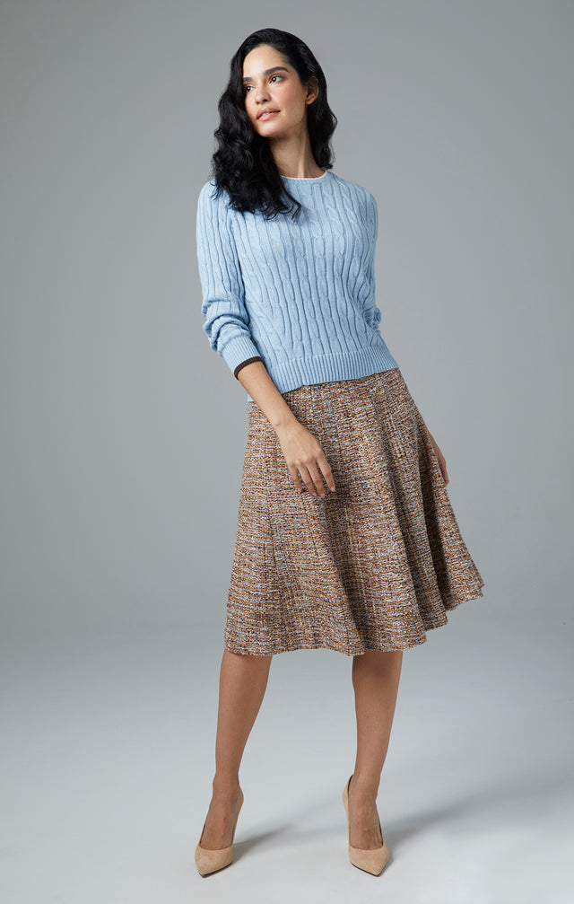 Lookbook image of a model wearing the Enfold skirt.