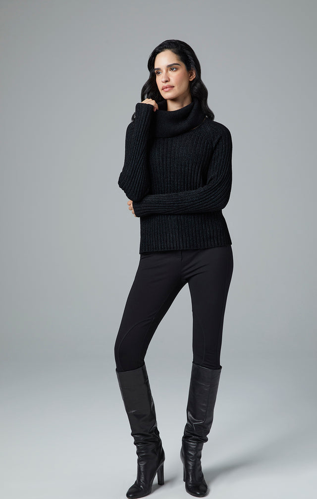 Lookbook image of a model wearing the Trinity sweater.